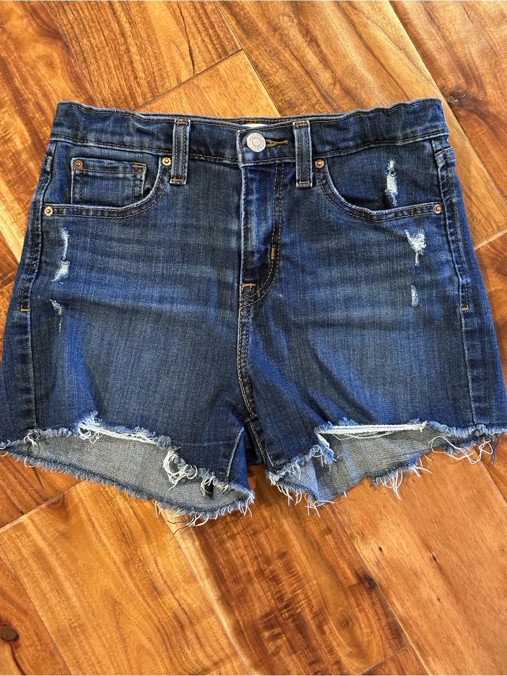 Levi’s Dark Blue Distressed Denim Shorts